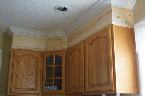 diy kitchen cabinet upgrade with paint and crown molding