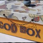 Box made cool with scrapbook paper and metal embellishments...