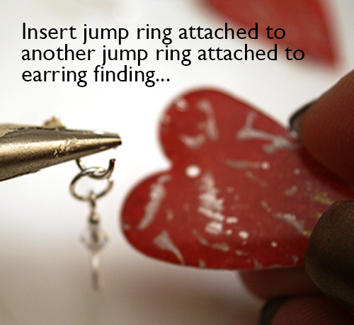 inserting jump rings into earring holes