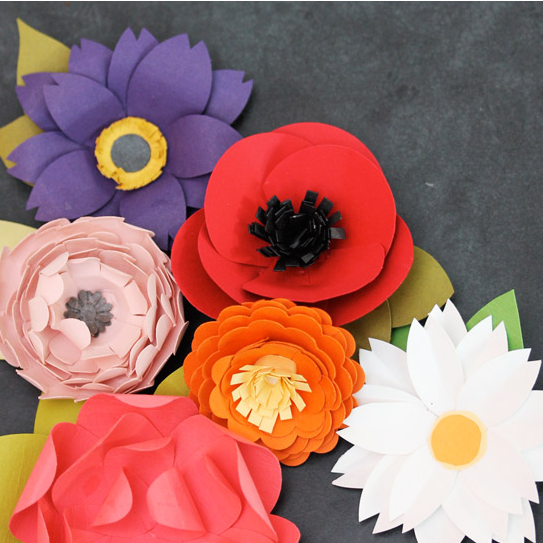 Make Easy Paper Punch Flowers at Damask Love, featured by @savedbyloves