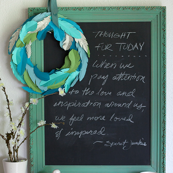 Learn how to make this paper feather wreath by Lia Griffith, featured @savedbyloves